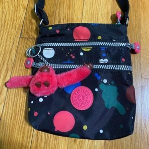 Kipling over the shoulder bag.